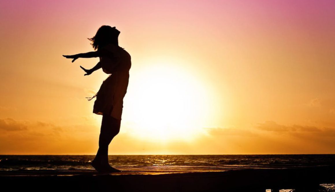 woman-happiness-sunrise-silhouette-40192